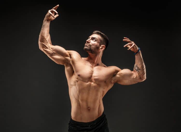 Bodybuilder Posing In Gym