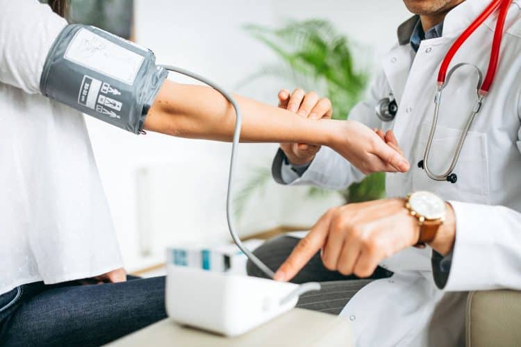 Doctor Measuring Blood Pressure