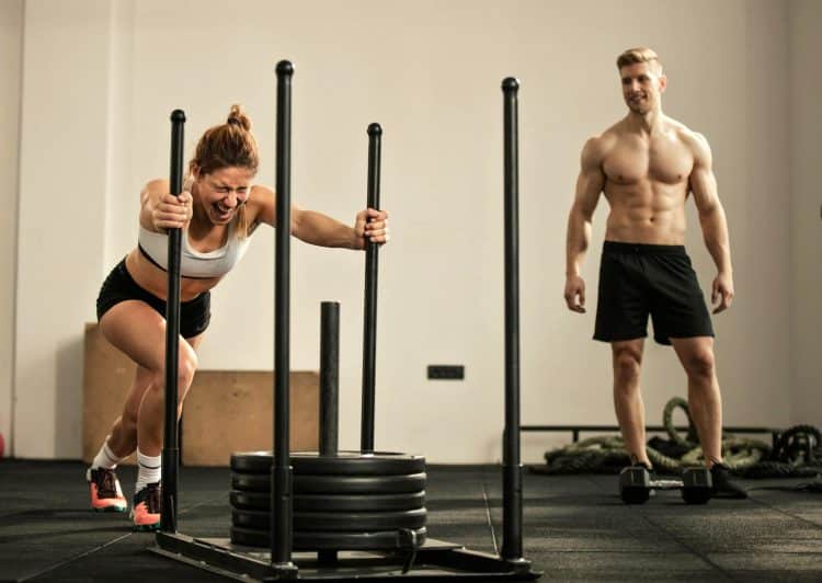 Woman Doing Sled Push Exercise
