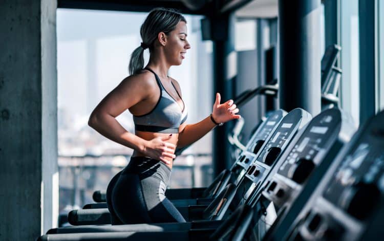 Woman Running on Treadmill